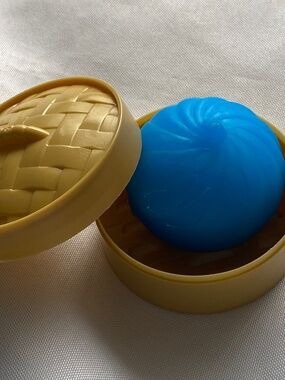 Dumpling Tear-Resistant Squeeze Ball Stress Toy in Steamer Basket